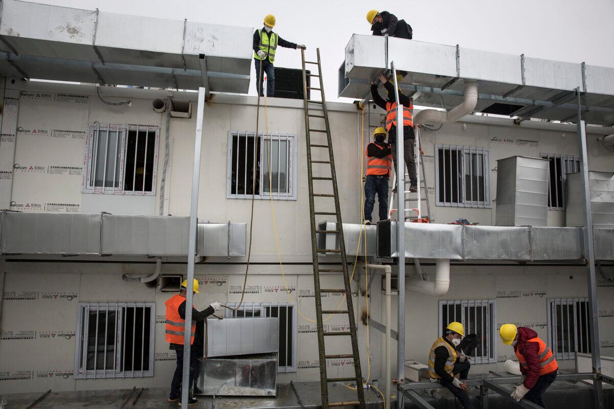 Workers building the Huoshenshan hospital built in response to the coronavirus outbreak and with a capacity of 1000 beds in Wuhan, China on Feb. 2, 2020. (Getty Images)