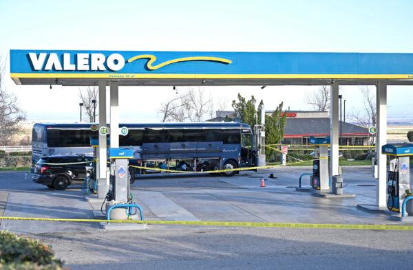Investigators are seen outside of a Greyhound bus after a passenger was killed on board on Feb. 3, 2020 in Lebec, Calif. (Jayne Kamin-Oncea/AP Photo)