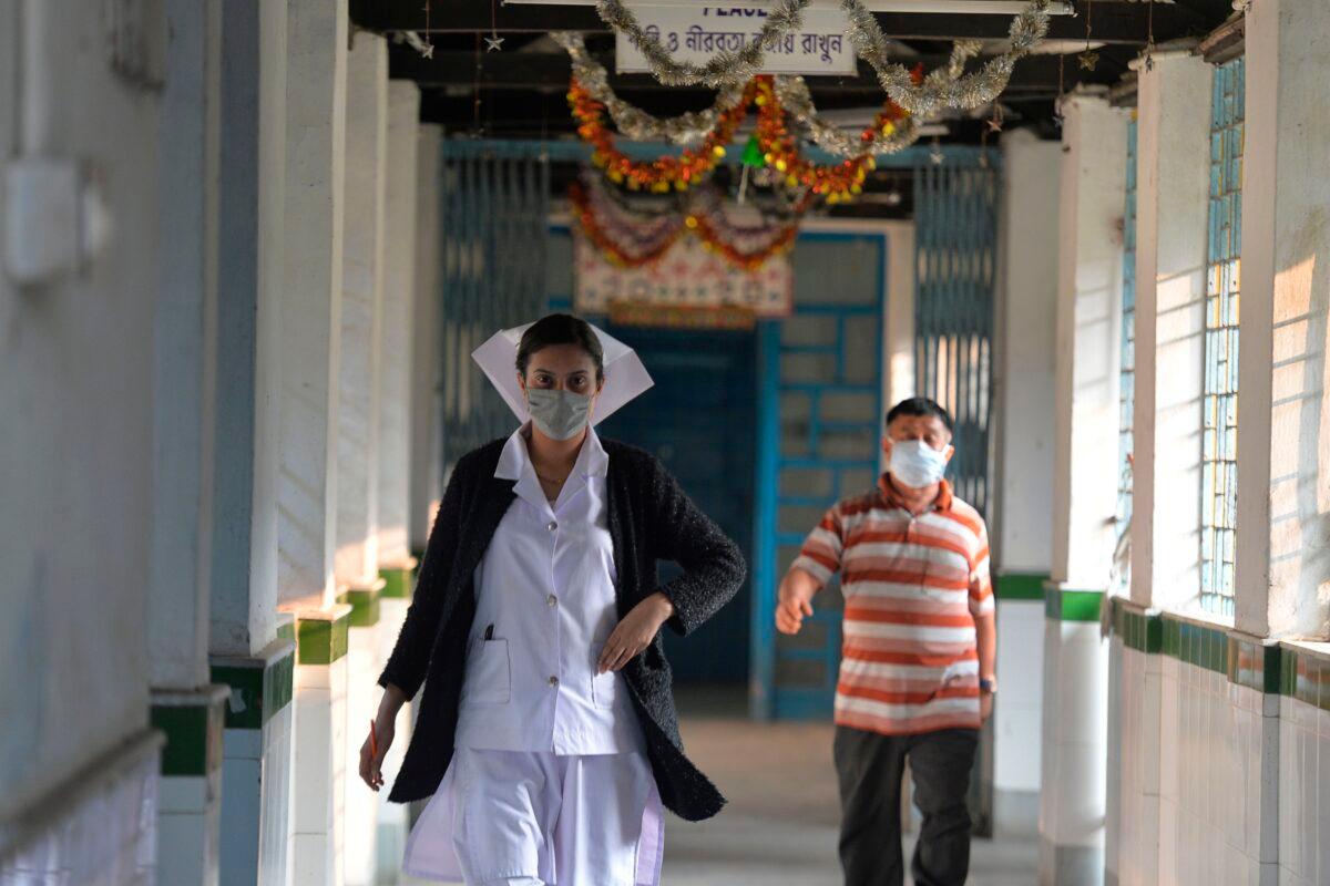 A nurse wearing a facemask walks inside an isolation ward opened as a preventative measure at the North Bengal Medical College and Hospital in Siliguri on Feb. 4, 2020. (ADiptendu Dutta/AFP via Getty Images)