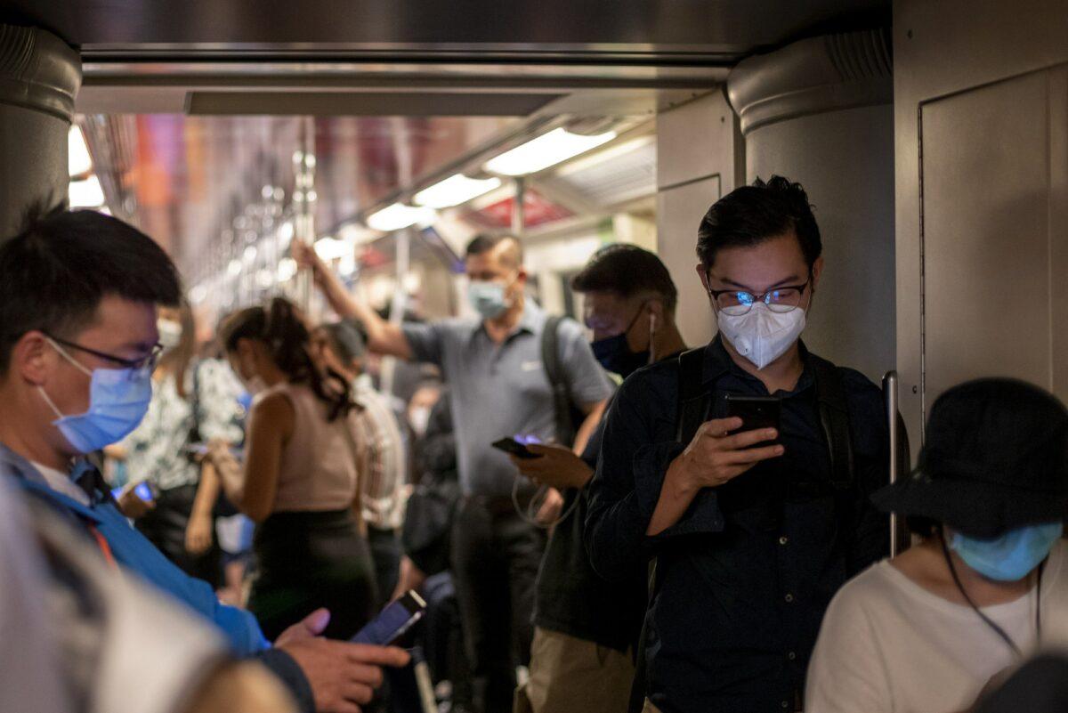 Commuters wear face masks to protect themselves from air pollution and new virus in Bangkok, Thailand, on Feb. 5, 2020. (Gemunu Amarasinghe/AP Photo)
