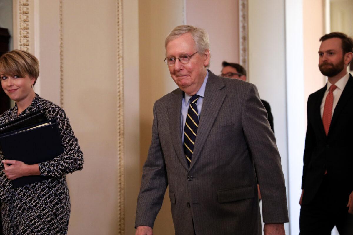Senate Majority Leader Sen. Mitch McConnell (R-Ky.) walks to the Senate Chamber after a break in the closing arguments of the impeachment trial of President Donald Trump in Washington on Feb. 3, 2020. (Charlotte Cuthbertson/The Epoch Times)