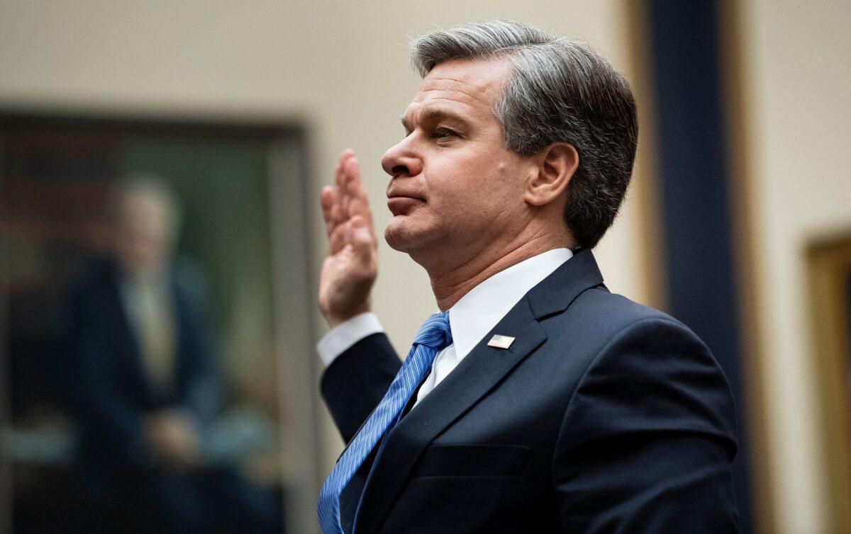 FBI Director Christopher Wray takes the oath before a full committee hearing on Oversight of the Federal Bureau of Investigation on Capitol Hill in Washington on Feb. 5, 2020. (Brendan Smialowski/AFP via Getty Images)