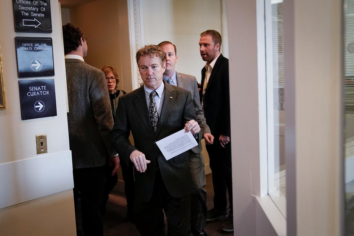 Sen. Rand Paul (R-Ky.) leaves a brief news conference during the Senate impeachment trial on January 30, 2020. (Drew Angerer/Getty Images)