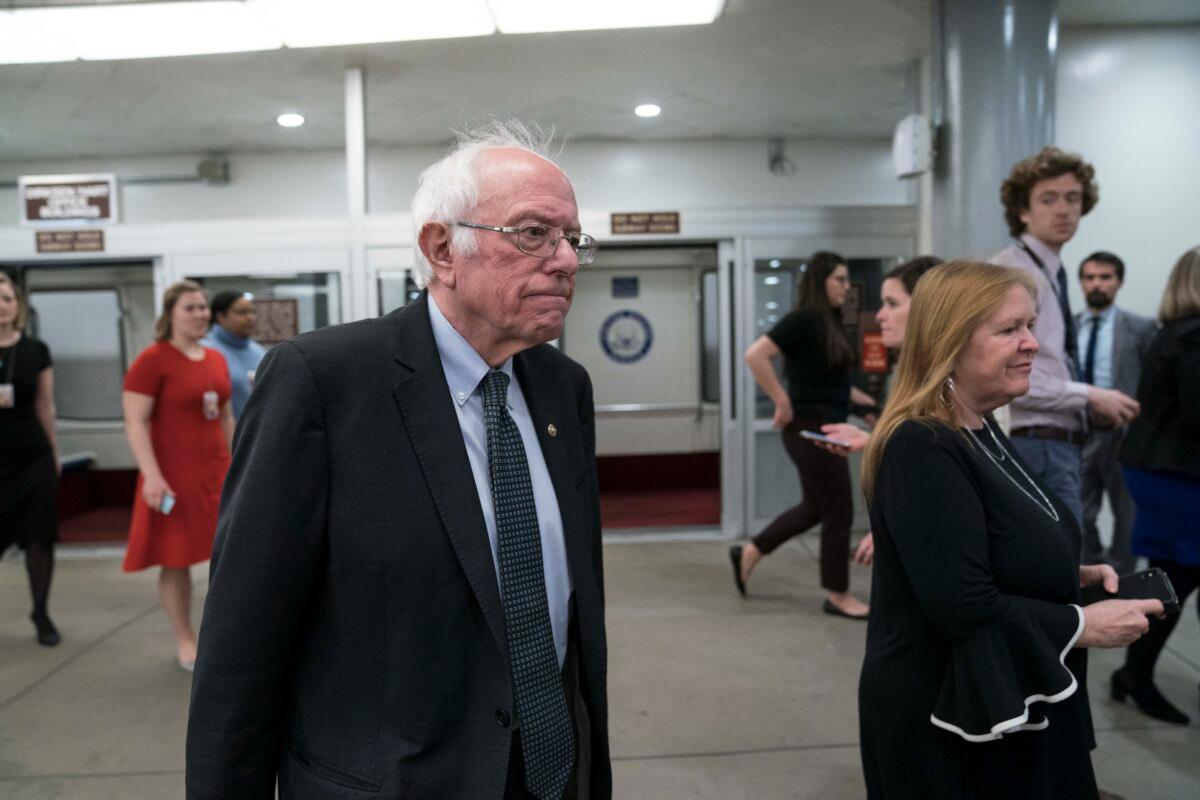 Sen. Bernie Sanders (I-Vt.) walks from the Senate subway to the Senate chamber to cast a vote in the Senate impeachment trial of President Donald Trump on Feb. 5, 2020. (Sarah Silbiger/Getty Images)