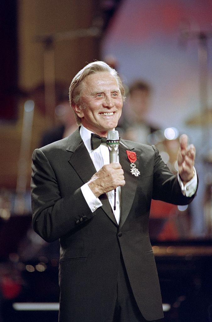 Douglas pictured during the 15th Nuit des Cesar ceremony in Paris on March 4, 1990 (©Getty Images | <a href="https://www.gettyimages.com/detail/news-photo/actor-kirk-douglas-is-pictured-during-15th-nuit-des-cesar-news-photo/623340758">JEAN-PIERRE MULLER/AFP</a>)