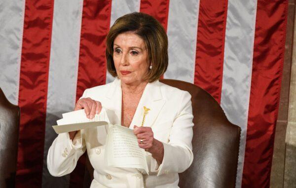 House Speaker Nancy Pelosi rips a copy of President Donald Trump's State of the Union speech. (MANDEL NGAN/AFP via Getty Images)