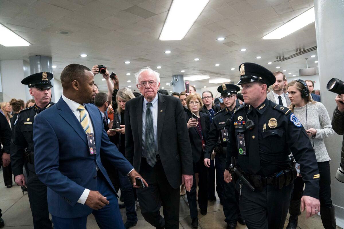 Sen. Bernie Sanders (I-Vt) walks to the Senate subway following a vote in the Senate impeachment trial that acquitted President Donald Trump of all charges in Washington on Feb. 5, 2020. (Sarah Silbiger/Getty Images)