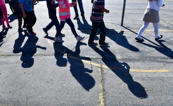 A file photo of elementary school students in Pacoima, Calif., on Feb. 8, 2019. (Frederic J. Brown/AFP via Getty Images)