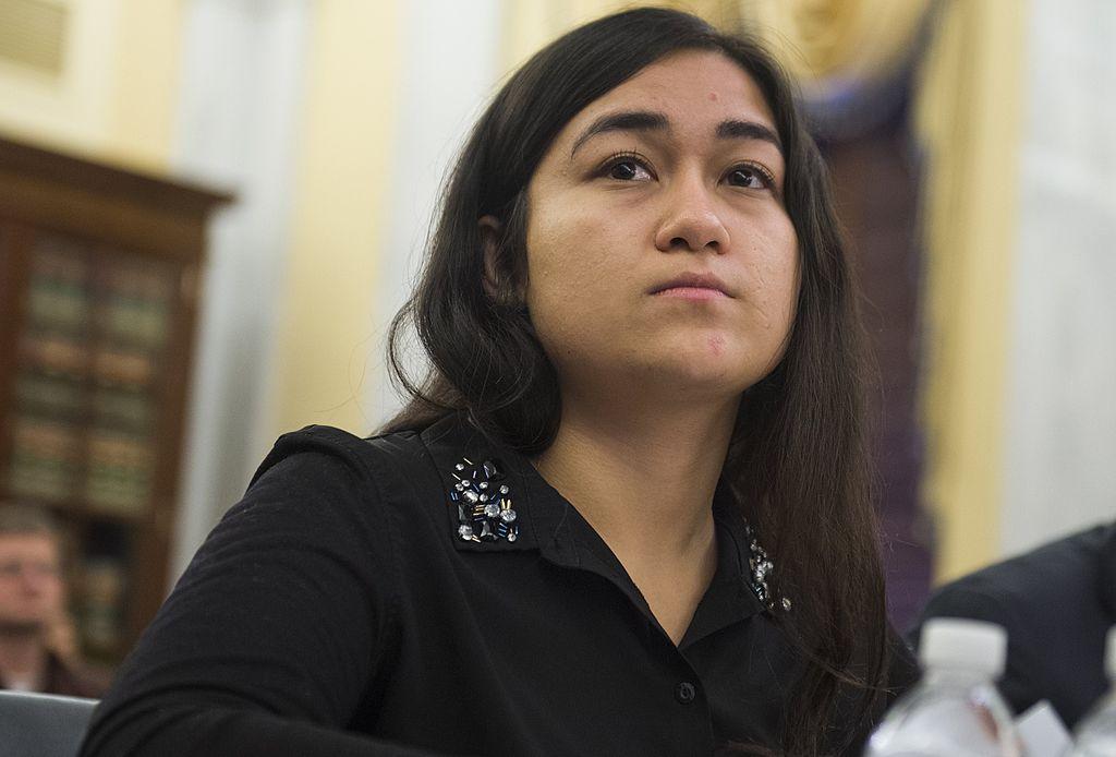 Jewher Ilham, daughter of Ilham Tohti, at the Congressional-Executive Commission on China on Capitol Hill in Washington on April 8, 2014. (SAUL LOEB/AFP via Getty Images)