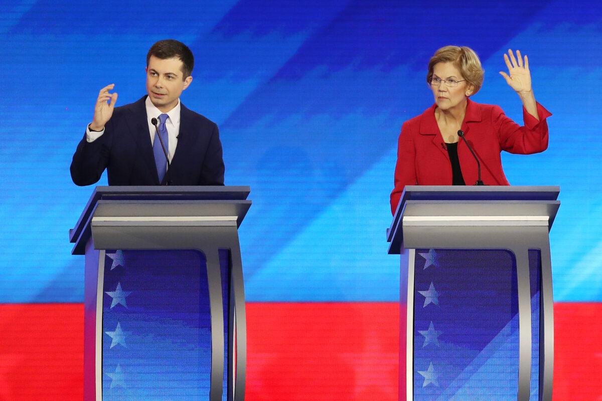 Democratic presidential candidates former South Bend, Indiana Mayor Pete Buttigieg and Sen. Elizabeth Warren (D-Mass.) during the eighth Democratic primary debate of the 2020 presidential campaign season at St. Anselm College in Manchester, New Hampshire on Feb. 7, 2020. (Timothy A. Clary/AFP via Getty Images)