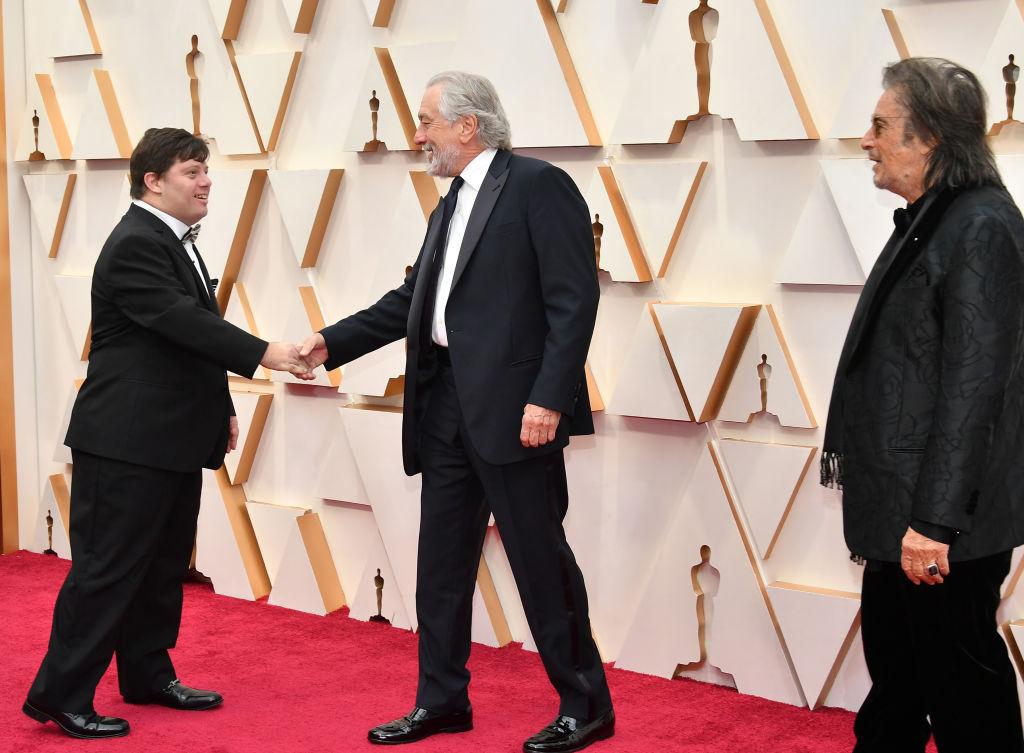 Gottsagen meets Robert De Niro and Al Pacino at the 92nd annual Oscars at Hollywood and Highland on Feb. 9, 2020. (©Getty Images | <a href="https://www.gettyimages.com/detail/news-photo/zack-gottsagen-robert-de-niro-and-al-pacino-attend-the-92nd-news-photo/1205139069?adppopup=true">Amy Sussman</a>)