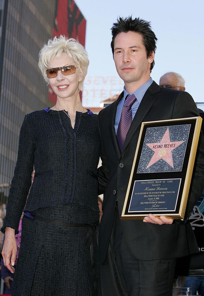 Reeves and Taylor pose at the ceremony honoring Reeves with a star on the Hollywood Walk of Fame on Jan. 31, 2005. (©Getty Images | <a href="https://www.gettyimages.com/detail/news-photo/actor-keanu-reeves-and-his-mother-patrica-taylor-pose-at-news-photo/52090585?adppopup=true">Vince Bucci</a>)