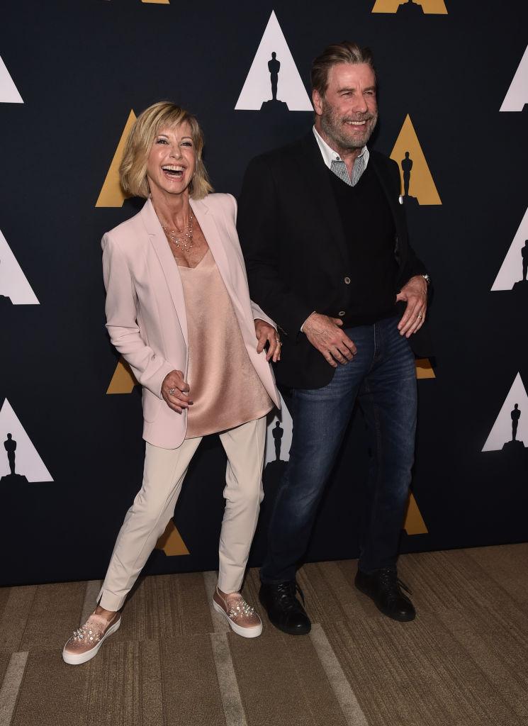 Newton-John and Travolta attend the "Grease" 40th-anniversary screening at Samuel Goldwyn Theater in Beverly Hills, California, on Aug. 15, 2018. (©Getty Images | <a href="https://www.gettyimages.com/detail/news-photo/olivia-newton-john-and-john-travolta-attend-the-grease-40th-news-photo/1017377354?adppopup=true">Alberto E. Rodriguez</a>)