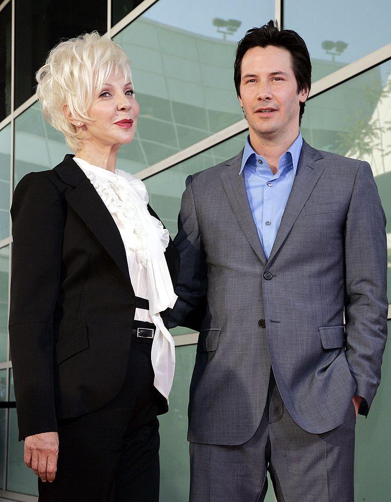 Reeves and Taylor arrive at the premiere of Warner Bros. Pictures' 'The Lake House' at the Cinerama Dome in Los Angeles, California, on June 13, 2006. (©Getty Images | <a href="https://www.gettyimages.com/detail/news-photo/actor-keanu-reeves-and-his-mother-costume-designer-patricia-news-photo/71201377?adppopup=true">Kevin Winter</a>)
