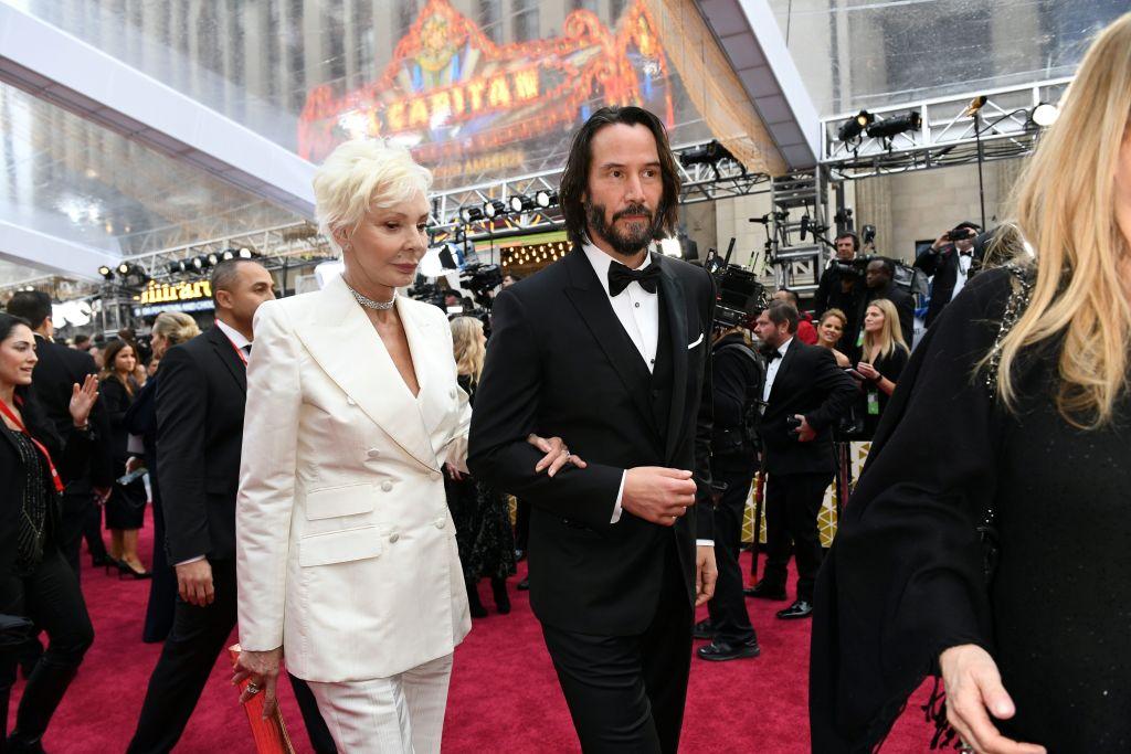 Reeves walks the red carpet with his mother for the 92nd annual Oscars at the Dolby Theater in Hollywood, California, on Feb. 9, 2020 (©Getty Images | <a href="https://www.gettyimages.com/detail/news-photo/actor-keanu-reeves-arrives-with-his-mother-for-the-92nd-news-photo/1199755784?adppopup=true">VALERIE MACON</a>)