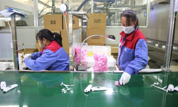 China Factory Activity Unexpectedly Expands, but Economy Cannot Shake Off Virus Shock