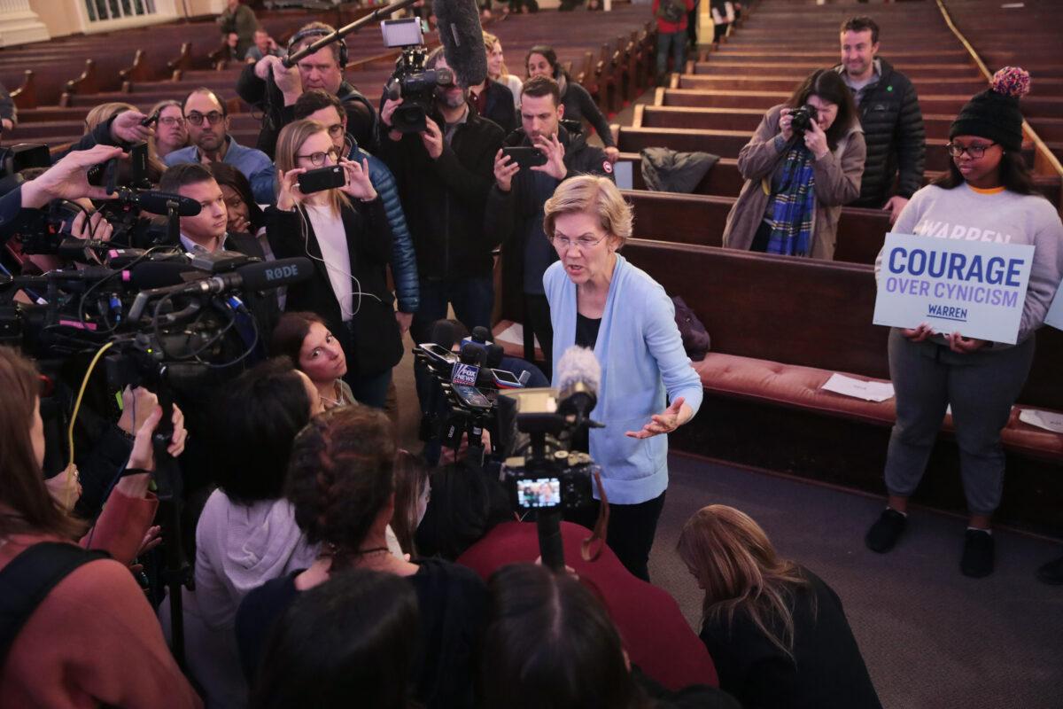 Democratic presidential candidate Sen. Elizabeth Warren (D-Mass.) speaks to the press following a town hall at South Church in Plymouth, New Hampshire on Feb. 10, 2020. (Scott Olsen/Getty Images)
