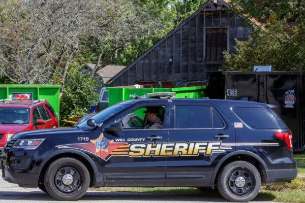 Will County Sheriff's patrol car is stationed outside the home of deceased Dr. Ulrich Klopfer in unincorporated Crete, Ill., on Sept. 19, 2019. (Teresa Crawford/AP Photo/File)