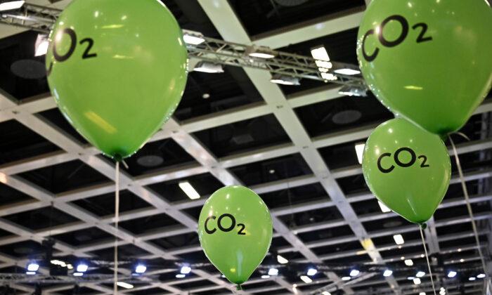 Benefits of Carbon Dioxide Emissions Exceed Costs for at Least the Next 30 Years