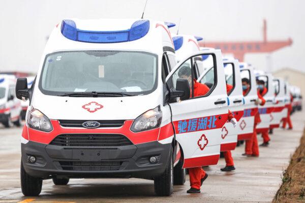 Negative pressure protection and monitoring ambulances are preparing to leave for Wuhan in Nanchang in China's central Jiangxi province on Feb. 12, 2020. (STR/AFP via Getty Images)