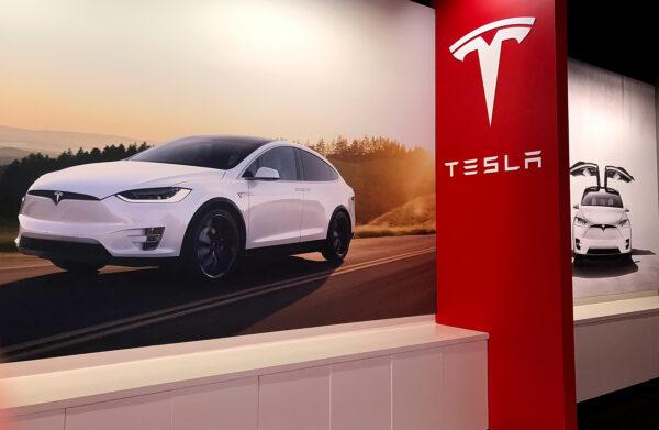 Posters showing the Tesla Model X are displayed at a Tesla showroom in Corte Madera, Calif., on Aug. 2, 2017. (Justin Sullivan/Getty Images)