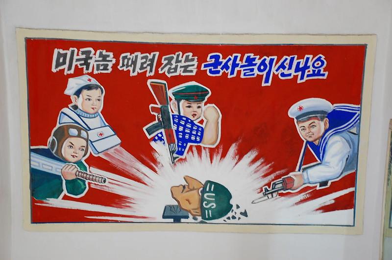 Propaganda poster in a primary school at the Chongsan-ri Farm. (<a href="https://commons.wikimedia.org/wiki/File:Propaganda_poster_in_a_primary_school_-_DPRK_(2604154887).jpg">stephan</a>/CC BY-SA 2.0)