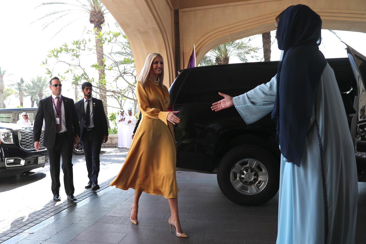 Ivanka Trump, second from right, the daughter and senior adviser to President Donald Trump, prepares to shake hands with Lamia Abdulaziz Khan, executive director of the Global Women's Forum, upon her arrival in Dubai, United Arab Emirates, on Feb. 16, 2020. (AP Photo/Kamran Jebreili)
