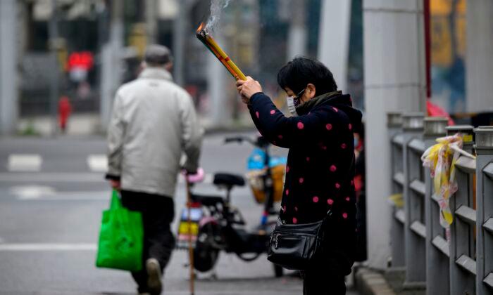 Chinese Cities Enact More Restrictive Measures to Contain Coronavirus