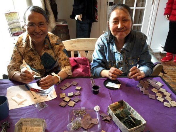 Inuit craftswomen work at Rannva Design in Iqualiut, Nunavut. (Courtesy Rannva Erlingsdottir Simonsen)