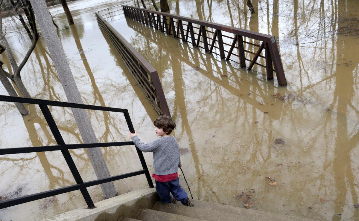 Heavy rains fell Monday leaving the Tuscaloosa, Ala., area with high water and washed out roads, on Feb. 11, 2020. (Gary Cosby Jr./The Tuscaloosa News via AP)