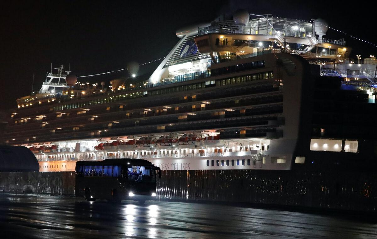 Buses believed to carry the U.S. passengers of the cruise ship Diamond Princess, where dozens of passengers were tested positive for coronavirus, leave at Daikoku Pier Cruise Terminal in Yokohama, south of Tokyo, Japan on Feb. 17, 2020. (Issei Kato/Reuters)