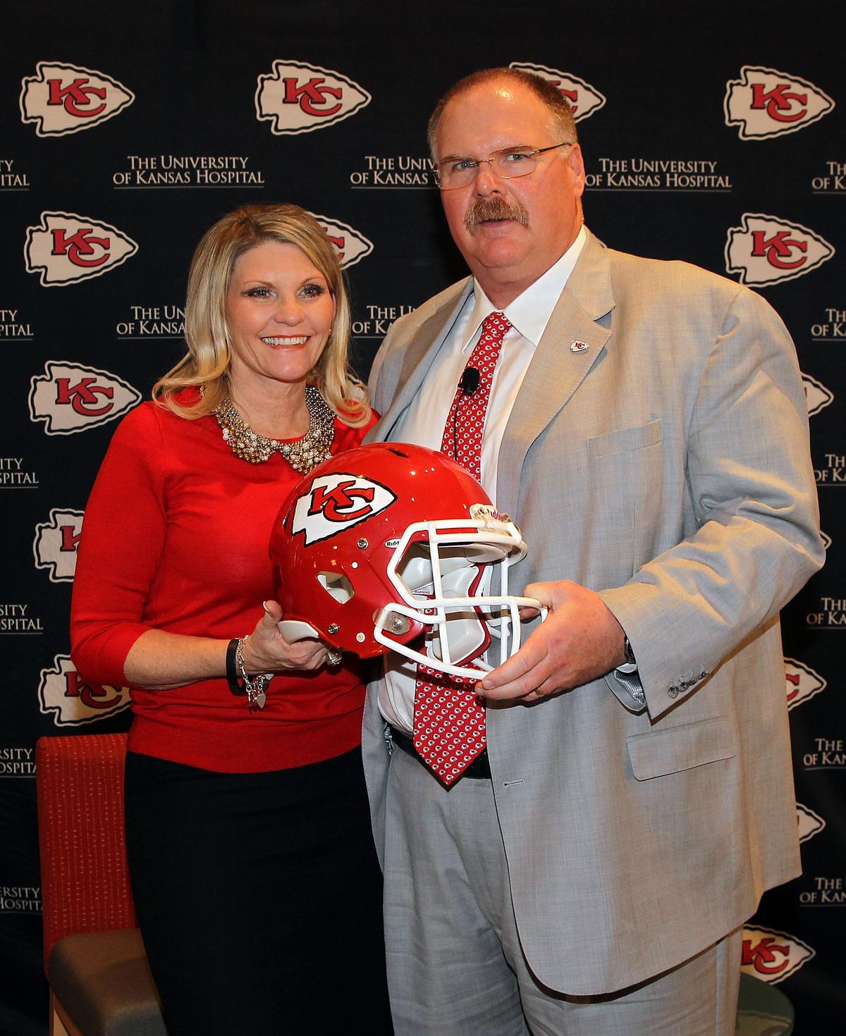 Andy Reid with his wife, Tammy, during a press conference in Kansas City, Missouri, introducing Reid as the Kansas City Chiefs new head coach on Jan. 7, 2013 (©Getty Images | <a href="https://www.gettyimages.com/detail/news-photo/andy-reid-poses-with-wife-tammy-during-a-press-conference-news-photo/159074845?adppopup=true">Jamie Squire</a>)