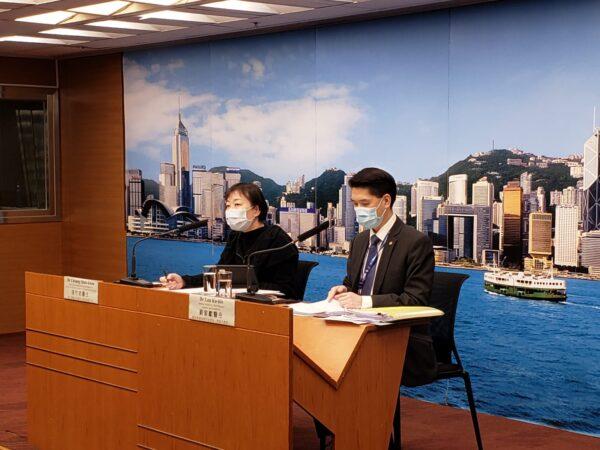 Chuang Shuk-kwan (L), head of the Communicable Disease Branch of the Center for Health Protection, and Lau Ka-hin, chief manager of quality and standards at Hong Kong’s Health Authority, speak at a press conference in Hong Kong, on Feb. 17, 2020. (Bill Cox/The Epoch Times)