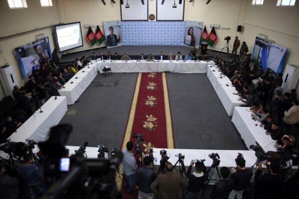Hawa Alam Nuristani, chief of Election Commission of Afghanistan, rear center, speaks during a press conference at the Independent Election Commission office in Kabul, Afghanistan, on Feb. 18, 2020. (Rahmat Gul/AP Photo)