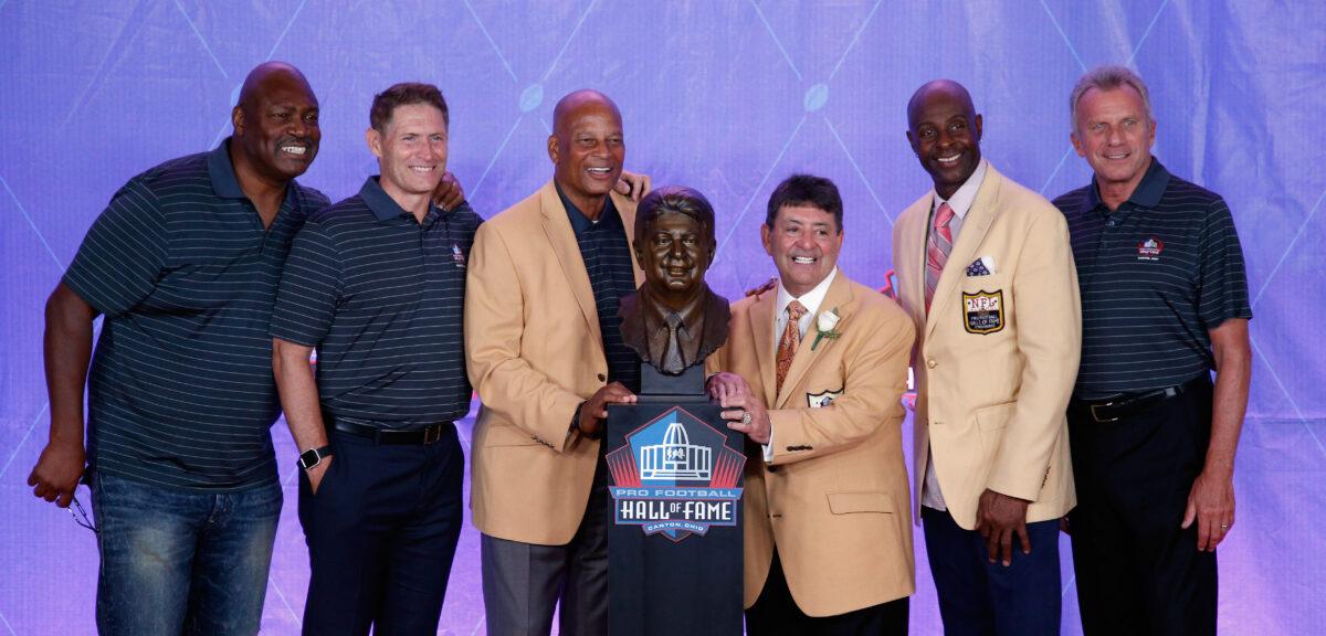 Edward DeBartolo, Jr. (3rd R), former San Francisco 49ers Owner, is seen with his bronze bust alongside former San Francisco 49ers, Charles Haley (L), Steve Young (2nd L), Ronnie Lott (3rd L), Jerry Rice (2nd R) and Joe Montana (R) during the NFL Hall of Fame Enshrinement Ceremony at the Tom Benson Hall of Fame Stadium in Canton, Ohio, on Aug. 6, 2016. ( Joe Robbins/Getty Images)