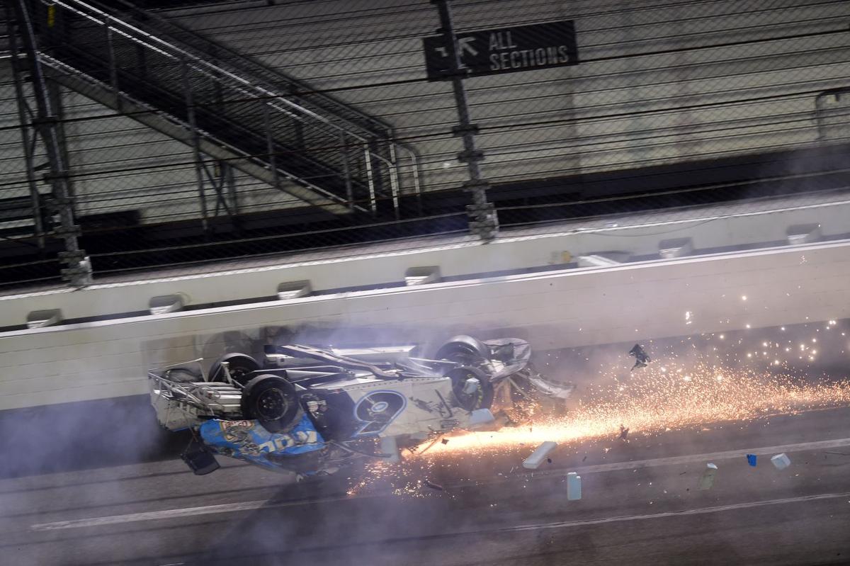 Ryan Newman, driver of the #6 Koch Industries Ford, crashes and flips behind them during the NASCAR Cup Series 62nd Annual Daytona 500 at Daytona International Speedway in Daytona Beach, Florida, on Feb. 17, 2020. (Jared C. Tilton/Getty Images)