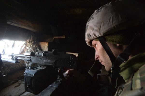 A serviceman at a position on the front line near the village of Zolote in the eastern Ukrainian region of Luhansk on Feb. 14, 2020. (Oleksandr Klymenko/Reuters)
