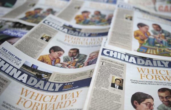 Copies of the Africa edition of the China Daily newspaper sits on a newsstand in the Kenyan capital Nairobi on Dec. 14, 2012. (Tony Karumba/AFP via Getty Images)