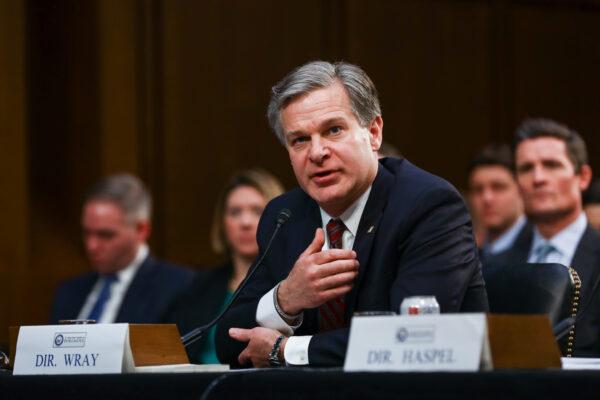 FBI Director Christopher Wray testifies at a hearing in front of the Senate Intelligence Committee in Congress in Washington, on Jan. 29, 2019. (Charlotte Cuthbertson/The Epoch Times)