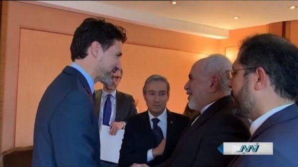 Prime Minister Justin Trudeau shakes hands with Iranian Foreign Minister Javad Zarif on the sidelines of the Munich Security Conference in Munich, Germany, on Feb. 14, 2020. (Via Reuters)