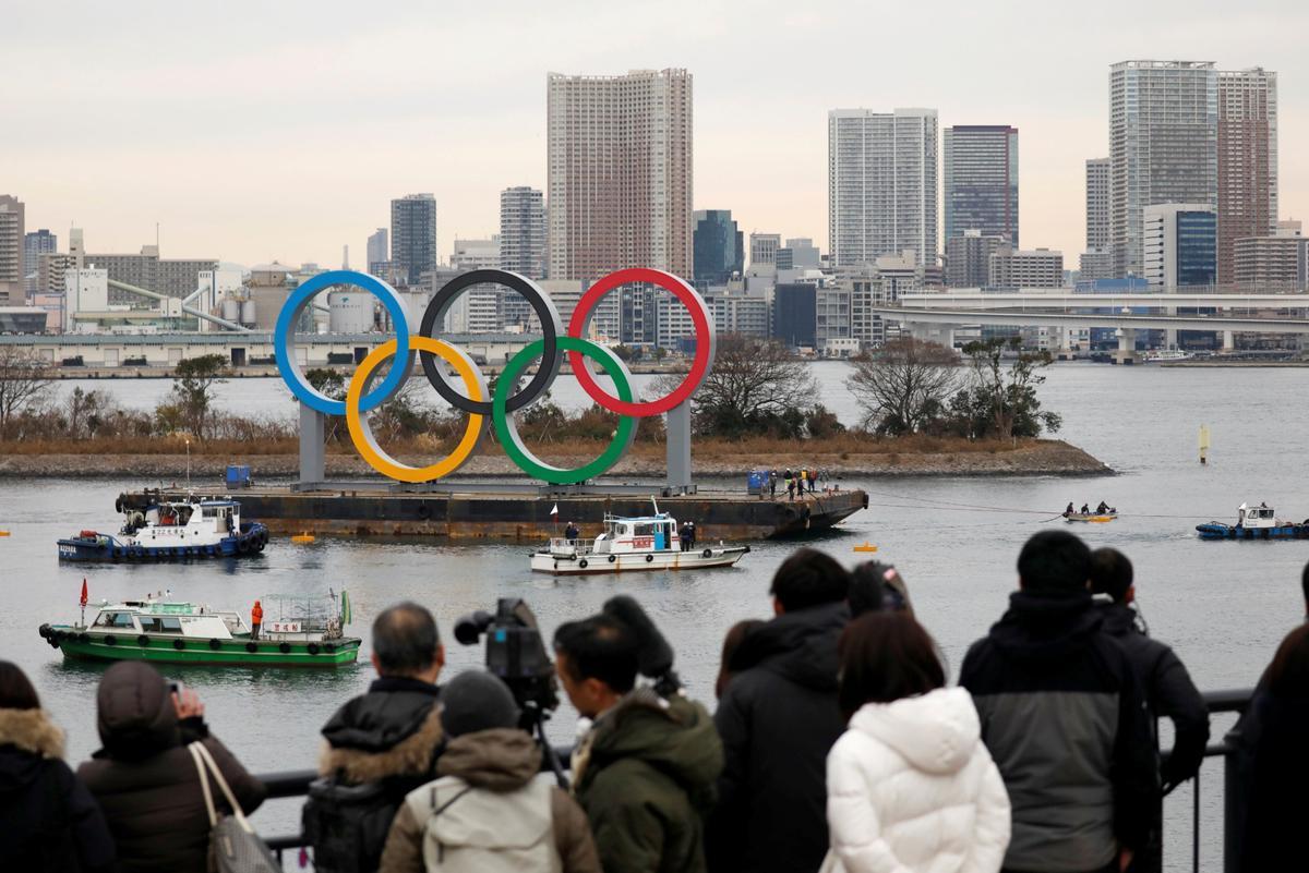 Giant Olympic Rings are installed at the waterfront area, with the Rainbow Bridge in the background, Tokyo 2020 Summer Olympic Games, at Odaiba Marine Park in Tokyo, Japan, on Jan. 17, 2020. (Issei Kato/Reuters/File Photo)