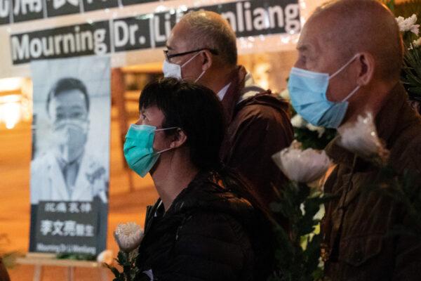 People attend a vigil to mourn for doctor Li Wenliang in Hong Kong, China, on Feb. 7, 2020. (Anthony Kwan/Getty Images)