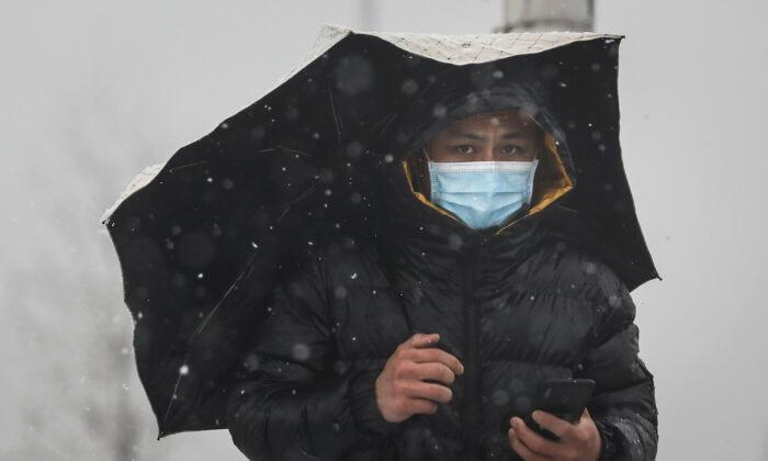 Absent State Help, Wuhan Locals Rely on Each Other to Survive the Coronavirus