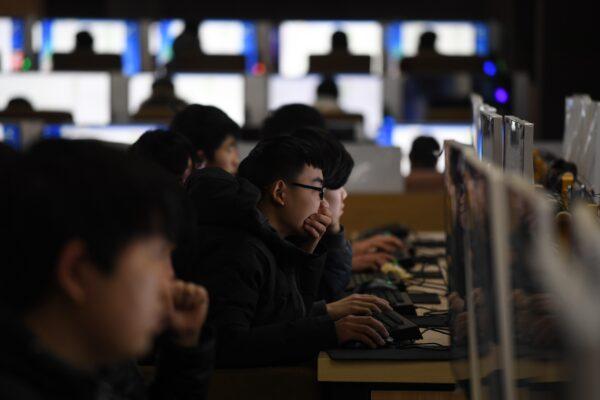Students studying car mechanics sit an exam in a computer room at a technical school in Jinan, in China's eastern Shandong province on Jan. 29, 2018. (Greg Baker/AFP via Getty Images)