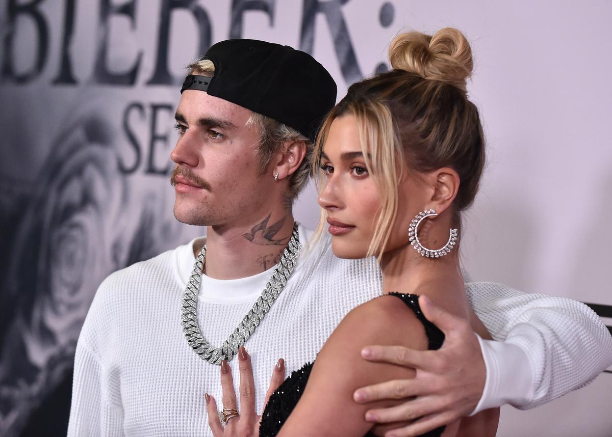 Bieber and his wife, model Hayley Baldwin, arrive for YouTube Originals' 'Justin Bieber: Seasons' premiere at the Regency Bruin Theater in Los Angeles on Jan. 27, 2020. (©Getty Images | <a href="https://www.gettyimages.com/detail/news-photo/canadian-singer-justin-bieber-and-wife-us-model-hailey-news-photo/1196904023?adppopup=true">LISA O'CONNOR</a>)