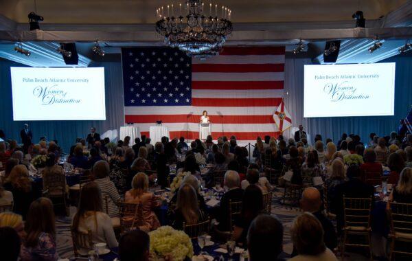 First Lady Melania Trump speaks from the lectern after receiving the "Women of Distinction" award at the Women of Distinction Luncheon in Palm Beach, Florida, Feb. 19, 2020. (Michele Eve Sandberg/AFP via Getty Images)