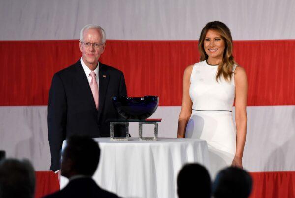 First Lady Melania Trump and Palm Beach Atlantic University President Bill Fleming at the Women of Distinction Luncheon in Palm Beach, Fla., on Feb. 19, 2020. (Michele Eve Sandberg/AFP via Getty Images)