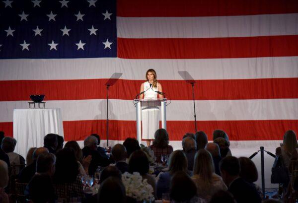 First Lady Melania Trump addresses the audience after receiving the "Women of Distinction" award from Palm Beach Atlantic University President Bill Fleming (out of frame) at the Women of Distinction Luncheon in Palm Beach, Florida, Feb. 19, 2020. (Michelae Eve Sandberg/AFP via Getty Images)