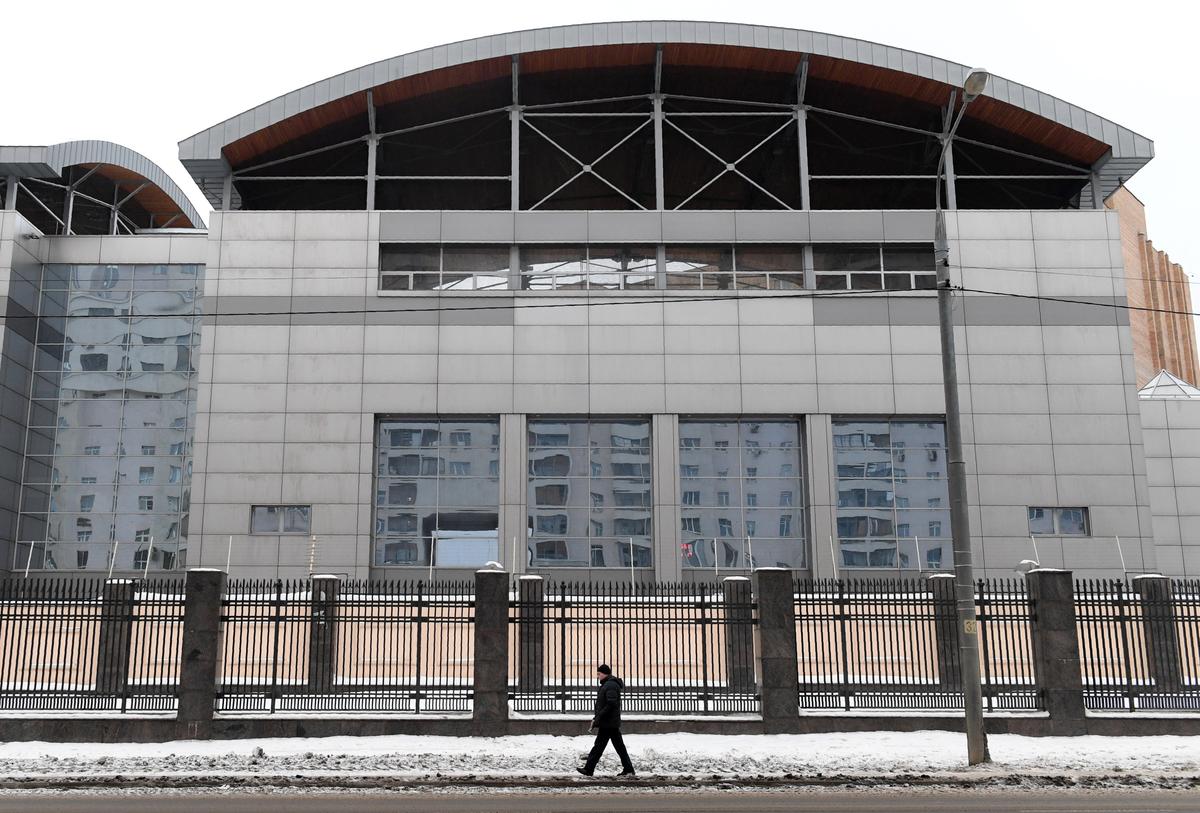 A man walks past the headquarters of the Russian General Staff's Main Intelligence Department (GRU) in Moscow in a file photograph. (Natalia Kolesnikova/AFP via Getty Images)