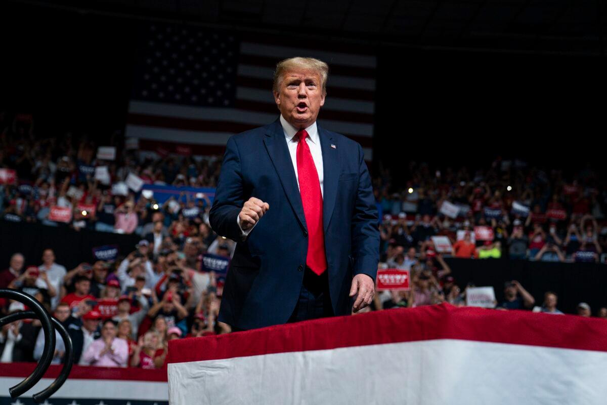 President Donald Trump arrives to speak at a campaign rally at Veterans Memorial Coliseum in Phoenix, Ariz., on Feb. 19, 2020. (Evan Vucci/AP Photo)